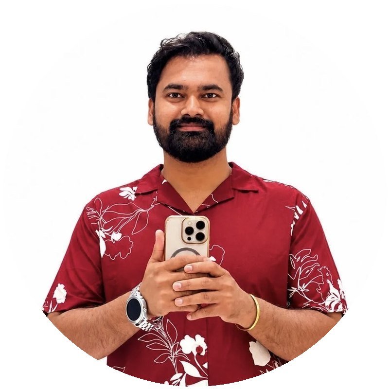 Foodie Lucky in a red floral shirt, holding his phone